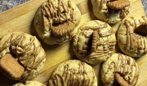 Homemade loaded Biscoff cookies topped with Lotus Biscoff biscuits and cookie butter drizzle.