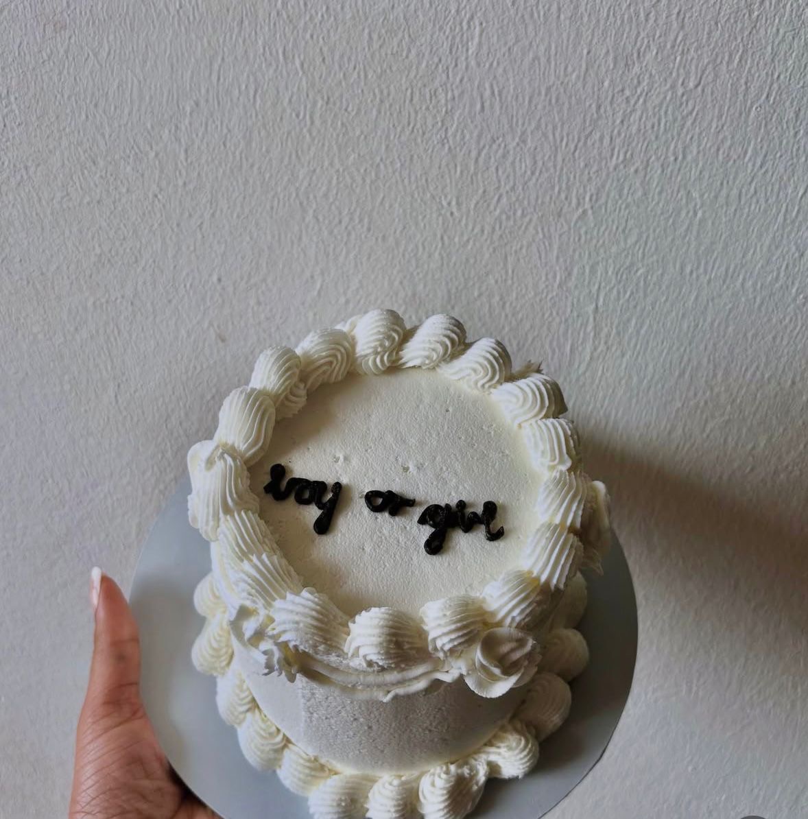 Gender reveal bento cake with vintage buttercream piping and Boy or Girl message